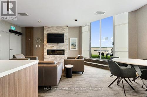 310 - 1276 Maple Crossing Boulevard, Burlington (Brant), ON - Indoor Photo Showing Other Room With Fireplace