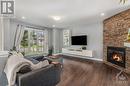 105 Mayer Street, Limoges, ON  - Indoor Photo Showing Living Room With Fireplace 