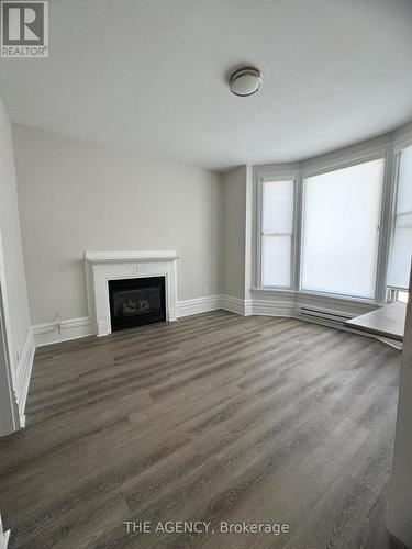 3 - 139 1/2 John Street S, Hamilton, ON - Indoor Photo Showing Other Room With Fireplace