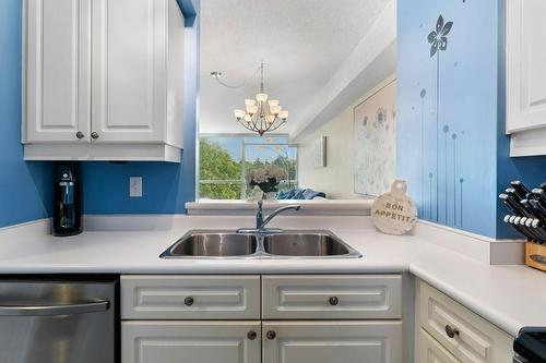 1276 Maple Crossing Boulevard|Unit #310, Burlington, ON - Indoor Photo Showing Kitchen With Double Sink