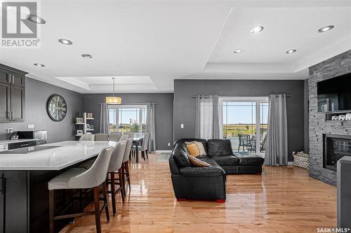 110 Canada Court, Hanley, SK - Indoor Photo Showing Living Room With Fireplace