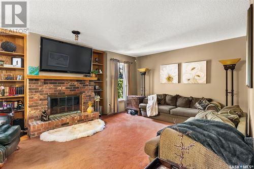 887 Dorothy Street, Regina, SK - Indoor Photo Showing Living Room With Fireplace