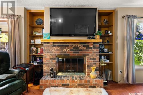 887 Dorothy Street, Regina, SK - Indoor Photo Showing Living Room With Fireplace