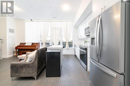 102 - 3220 William Coltson Avenue E, Oakville, ON - Indoor Photo Showing Kitchen With Stainless Steel Kitchen