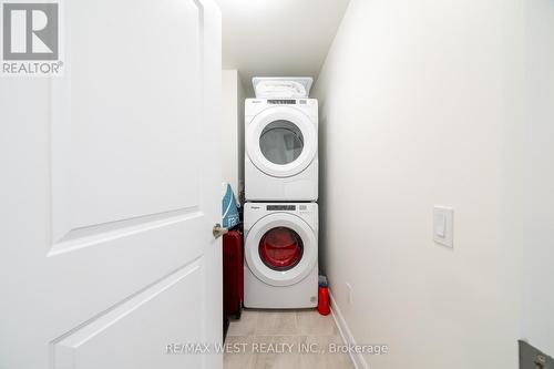 102 - 3220 William Coltson Avenue E, Oakville, ON - Indoor Photo Showing Laundry Room