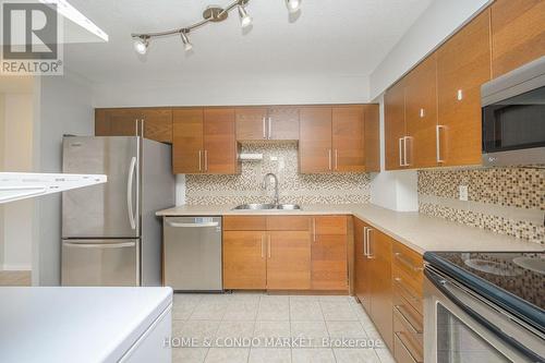 604 - 200 Robert Speck Parkway, Mississauga (City Centre), ON - Indoor Photo Showing Kitchen With Double Sink