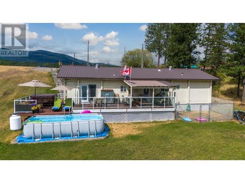 6280 Laurier Avenue, Wardner, BC - Outdoor With Above Ground Pool With Deck Patio Veranda With Backyard