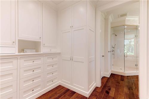 Meticulously designed floor to ceiling custom wardrobe cabinetry by Hallmark. - 183 Mill Street, Hamilton, ON - Indoor Photo Showing Other Room