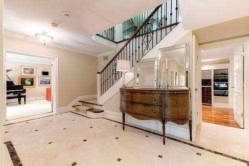 Foyer features custom marble heated floors. - 183 Mill Street, Hamilton, ON - Indoor Photo Showing Other Room