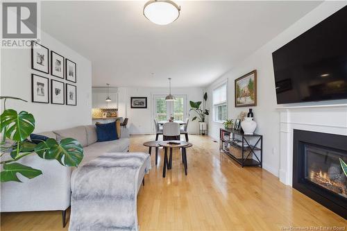 68 River Front Way, Fredericton, NB - Indoor Photo Showing Living Room With Fireplace