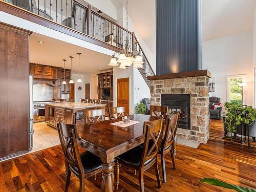 IntÃ©rieur - 321 Av. Du Parc, Magog, QC - Indoor Photo Showing Dining Room With Fireplace