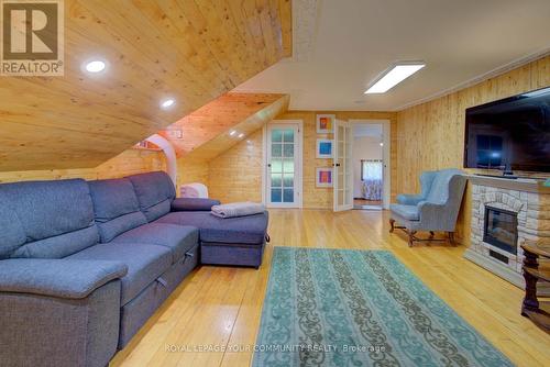 17 Drummond Street, Rideau Lakes, ON - Indoor Photo Showing Living Room With Fireplace