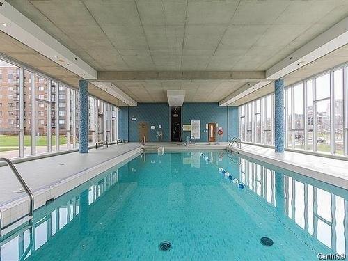 Pool - 1402-1200 Rue St-Jacques, Montréal (Ville-Marie), QC - Indoor Photo Showing Other Room With In Ground Pool