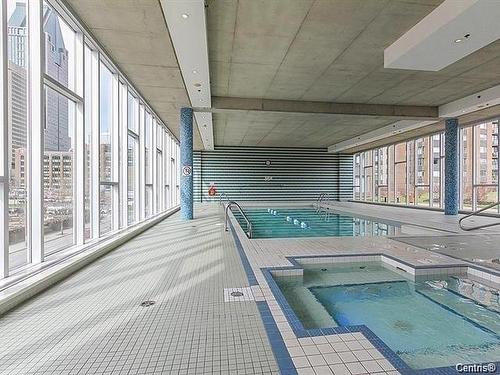 Pool - 1402-1200 Rue St-Jacques, Montréal (Ville-Marie), QC - Indoor Photo Showing Other Room With In Ground Pool