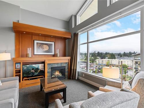 903C-181 Beachside Dr, Parksville, BC - Indoor Photo Showing Living Room With Fireplace