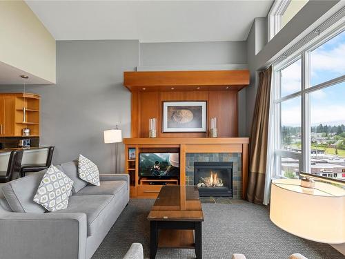 903C-181 Beachside Dr, Parksville, BC - Indoor Photo Showing Living Room With Fireplace