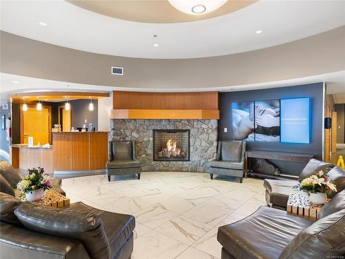 903C-181 Beachside Dr, Parksville, BC - Indoor Photo Showing Living Room With Fireplace