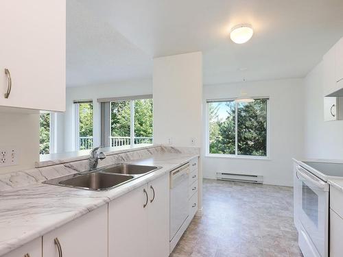 301C-698 Aspen Rd, Comox, BC - Indoor Photo Showing Kitchen With Double Sink