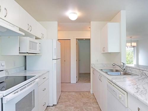 301C-698 Aspen Rd, Comox, BC - Indoor Photo Showing Kitchen With Double Sink