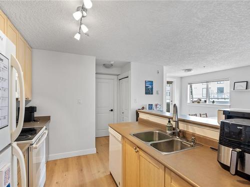 201-2829 Peatt Rd, Langford, BC - Indoor Photo Showing Kitchen With Double Sink