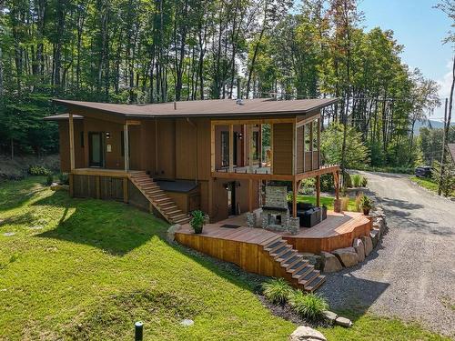 Aerial photo - 125 Allée Des Weskarinis, Mont-Tremblant, QC - Outdoor With Deck Patio Veranda