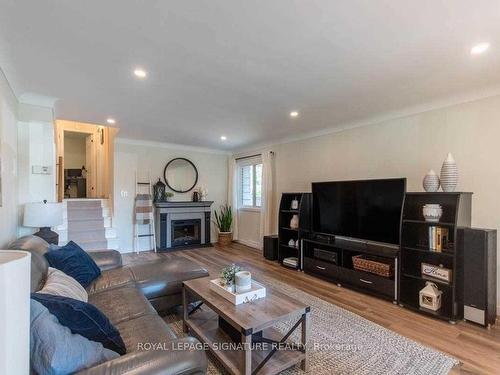 Main-55 Burness Dr, St. Catharines, ON - Indoor Photo Showing Living Room With Fireplace