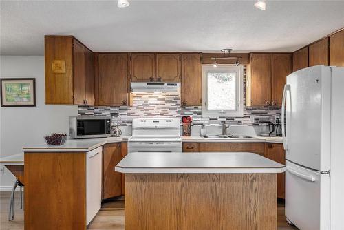 8514 Sun Valley Road, Kelowna, BC - Indoor Photo Showing Kitchen With Double Sink