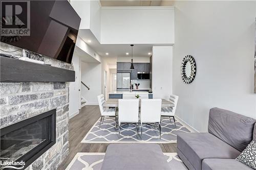 12 Beausoleil Lane Unit# 304, The Blue Mountains, ON - Indoor Photo Showing Living Room With Fireplace