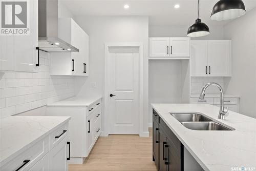 346 Dziadyk Bend, Saskatoon, SK - Indoor Photo Showing Kitchen With Double Sink