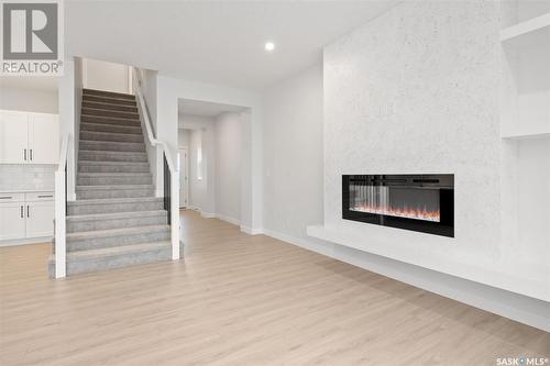 346 Dziadyk Bend, Saskatoon, SK - Indoor Photo Showing Living Room With Fireplace