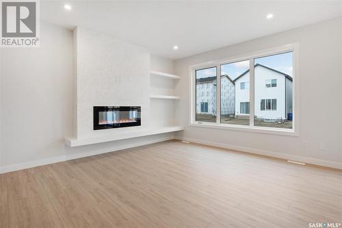 346 Dziadyk Bend, Saskatoon, SK - Indoor Photo Showing Living Room With Fireplace