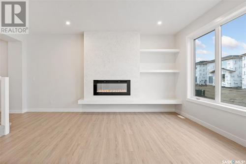 346 Dziadyk Bend, Saskatoon, SK - Indoor With Fireplace