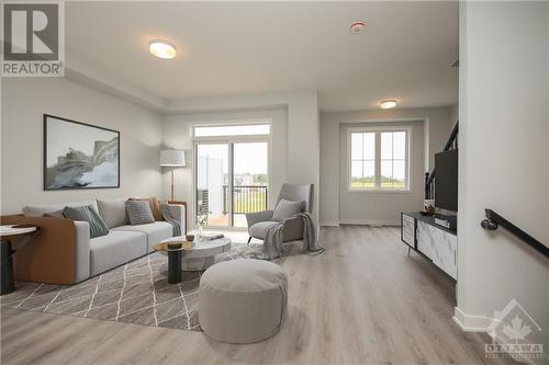 Images provided are to showcase builder Finishes - 249 David Lewis Private, Ottawa, ON - Indoor Photo Showing Living Room