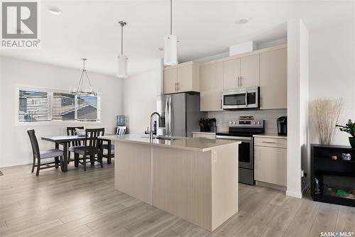 5004 Primrose Green Drive E, Regina, SK - Indoor Photo Showing Kitchen With Stainless Steel Kitchen With Upgraded Kitchen