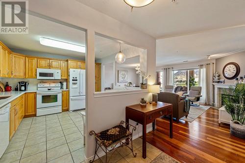 1967 Underhill Street Unit# 605 Lot# 99, Kelowna, BC - Indoor Photo Showing Kitchen With Fireplace