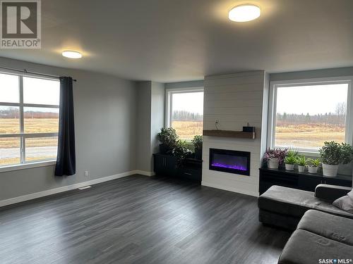 701 Bay Street, Hudson Bay, SK - Indoor Photo Showing Living Room With Fireplace