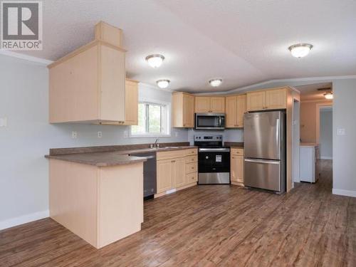 406-989 Range Road, Whitehorse, YT - Indoor Photo Showing Kitchen With Double Sink