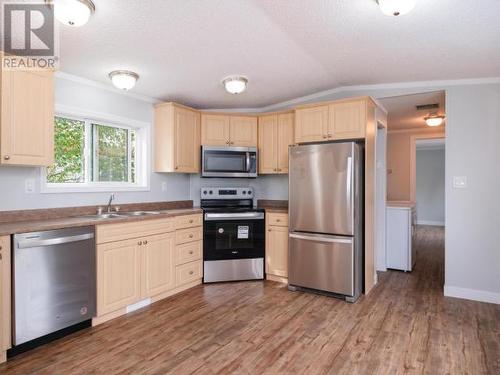 406-989 Range Road, Whitehorse, YT - Indoor Photo Showing Kitchen With Double Sink