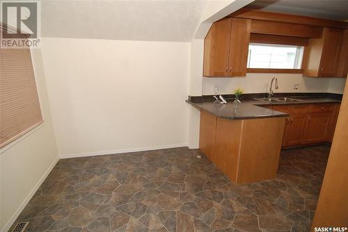 335 P Avenue S, Saskatoon, SK - Indoor Photo Showing Kitchen With Double Sink