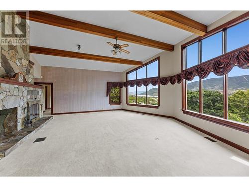 15021 Old Mission Road, Lake Country, BC - Indoor Photo Showing Other Room With Fireplace