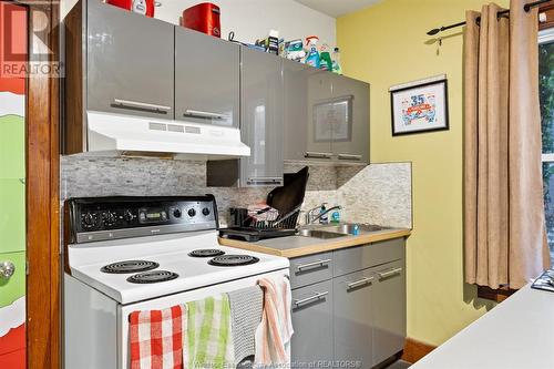 693-695 Partington, Windsor, ON - Indoor Photo Showing Kitchen With Double Sink