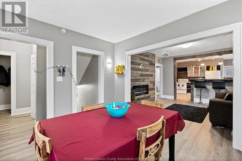 693-695 Partington, Windsor, ON - Indoor Photo Showing Other Room With Fireplace