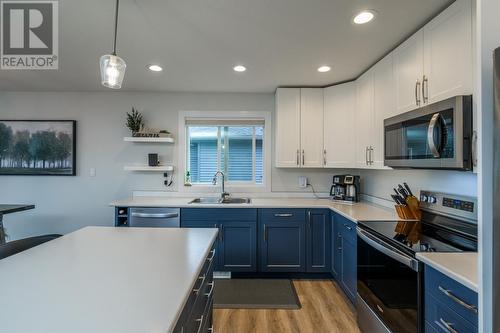 5542 W Venta Drive, Prince George, BC - Indoor Photo Showing Kitchen With Stainless Steel Kitchen With Double Sink