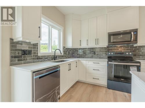 303 7000 Husband Drive, Prince George, BC - Indoor Photo Showing Kitchen With Upgraded Kitchen