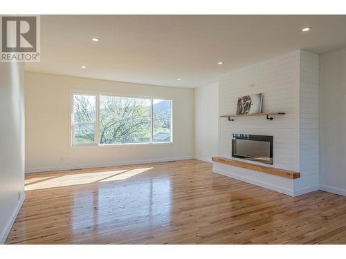 423 Pine Street, Chase, BC - Indoor Photo Showing Other Room With Fireplace