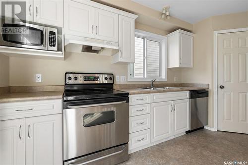 3139 37Th Street W, Saskatoon, SK - Indoor Photo Showing Kitchen With Double Sink