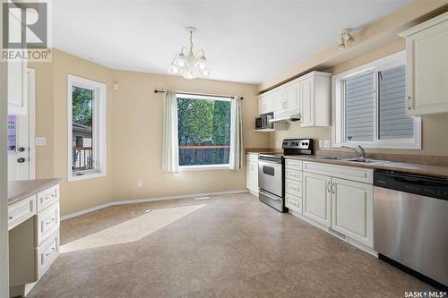 3139 37Th Street W, Saskatoon, SK - Indoor Photo Showing Kitchen With Double Sink