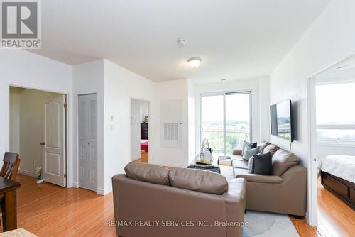 716 - 7405 Goreway Drive, Mississauga (Malton), ON - Indoor Photo Showing Living Room