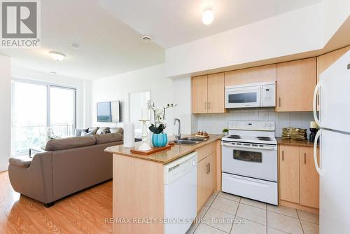 716 - 7405 Goreway Drive, Mississauga (Malton), ON - Indoor Photo Showing Kitchen With Double Sink