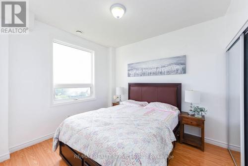 716 - 7405 Goreway Drive, Mississauga (Malton), ON - Indoor Photo Showing Bedroom